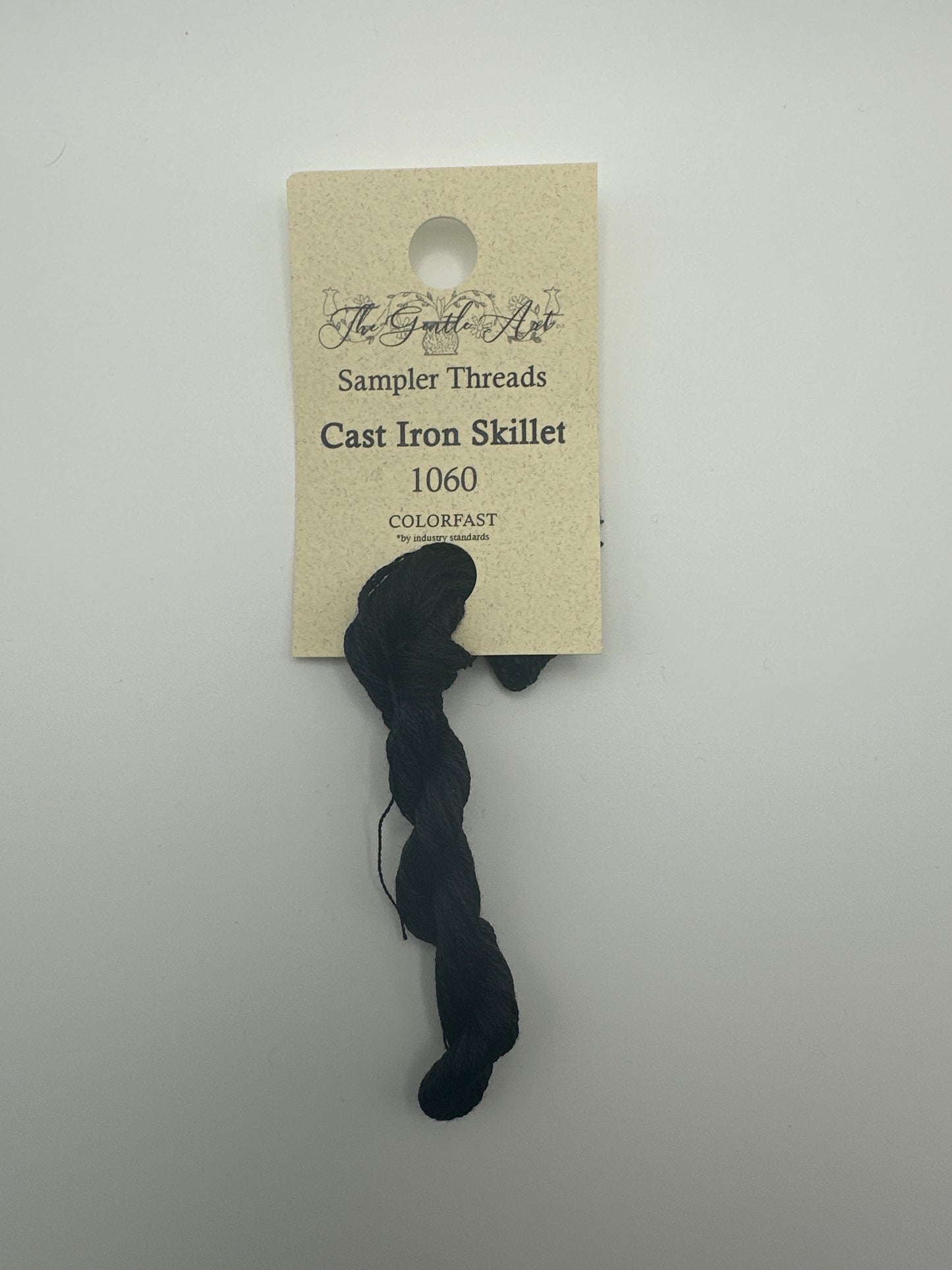 The Gentle Art Sampler Threads Cast Iron Skillet