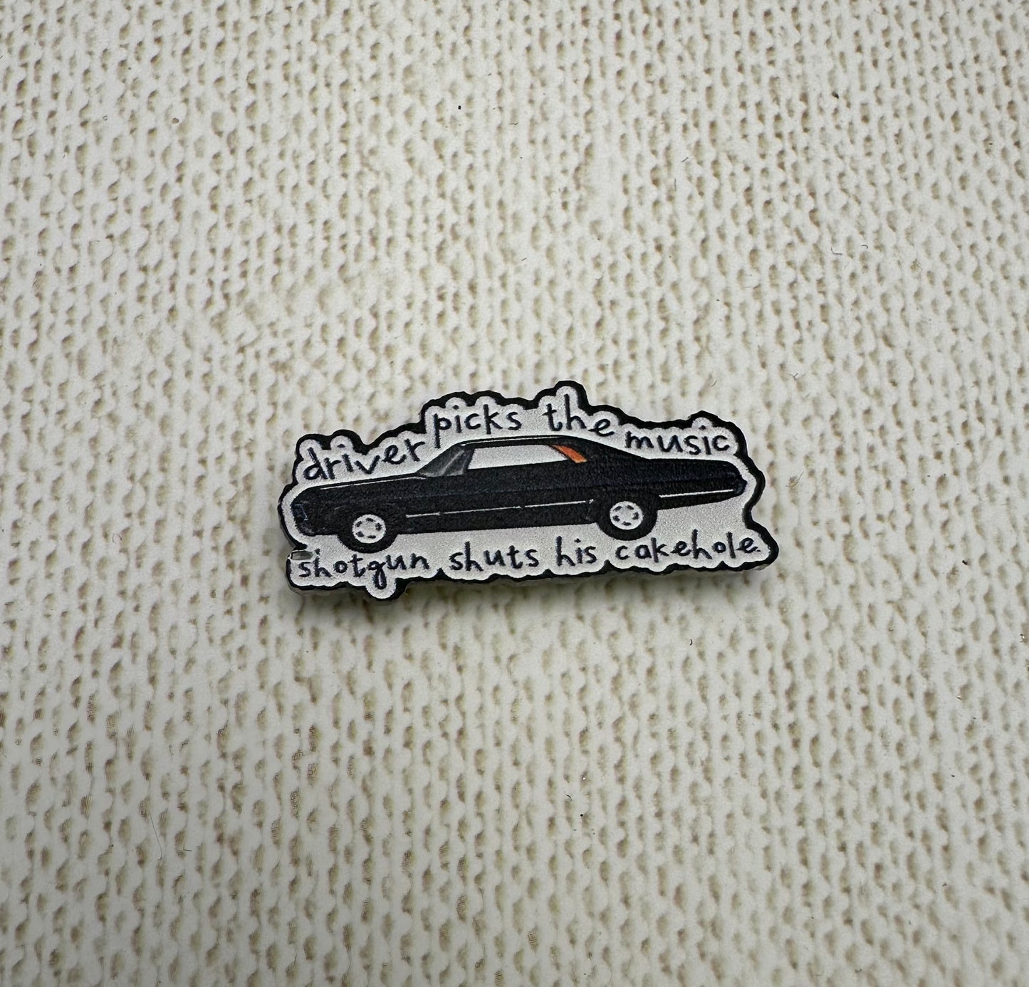 Driver Picks the Music Needle Minder
